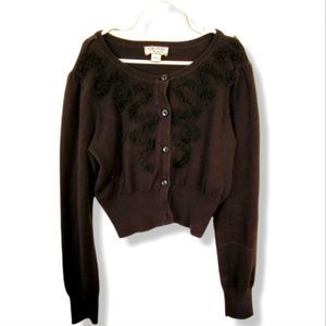 Black button up sweater with floral detail